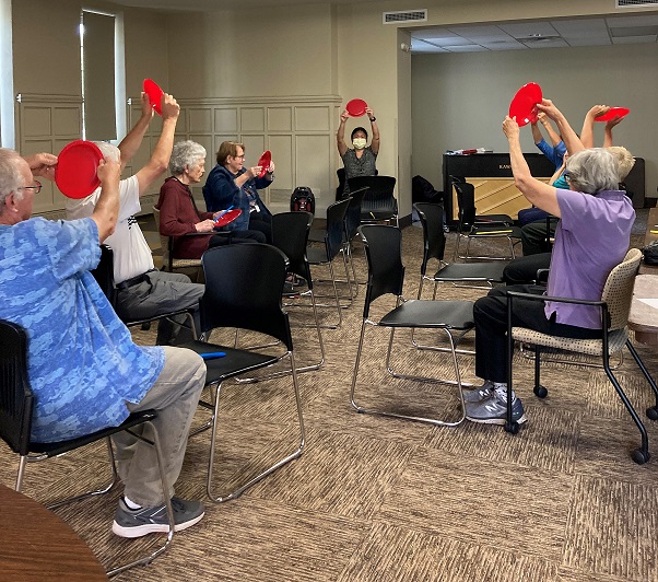 older people exercising to music